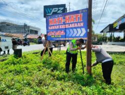 Antisipasi Lakalantas, Polres Aceh Barat Pasang Spanduk Imbauan di Lokasi Rawan Kecelakaan