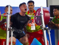 Angkat Besi Hampir Satu Ton, Andre Satria Pecahkan Rekor PON XXI hingga Nasional